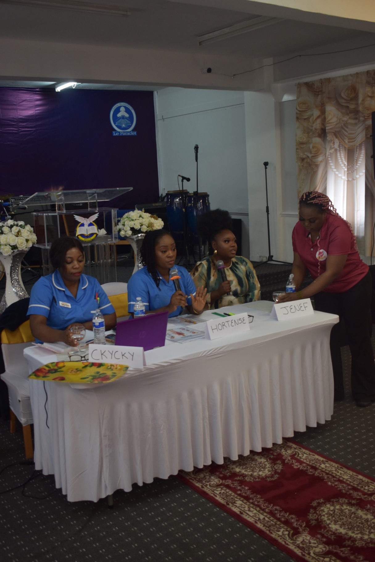 Ckycky Mishi Ndombasi and Hortense Mpungi speaking on the panel at the Community Health Awareness Event in Leeds